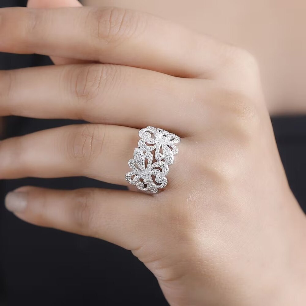 A White Diamond Accent Fleur De Lis Ring in Platinum Bond over Brass